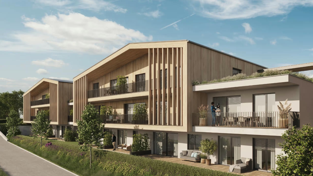 Wohnbauprojekte Weststeiermark — Wohnanlage mit Holzfassade, Balkonen und begrünter Dachterrasse