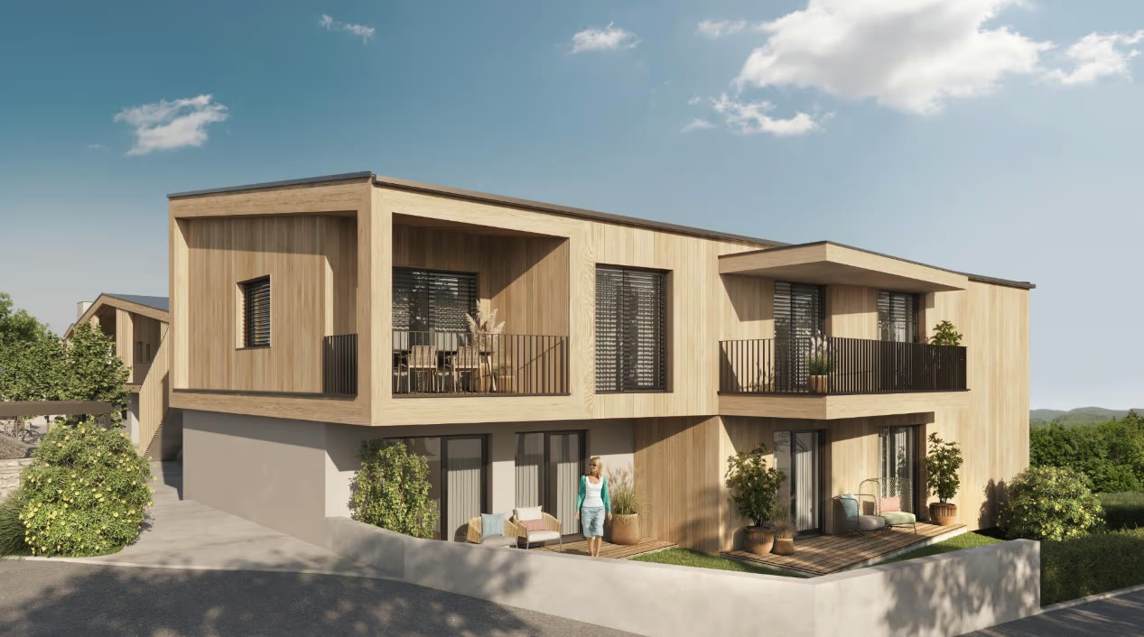 Wohnbauprojekte Weststeiermark — Wohnhaus mit Holzfassade und Terrassen im Erdgeschoss
